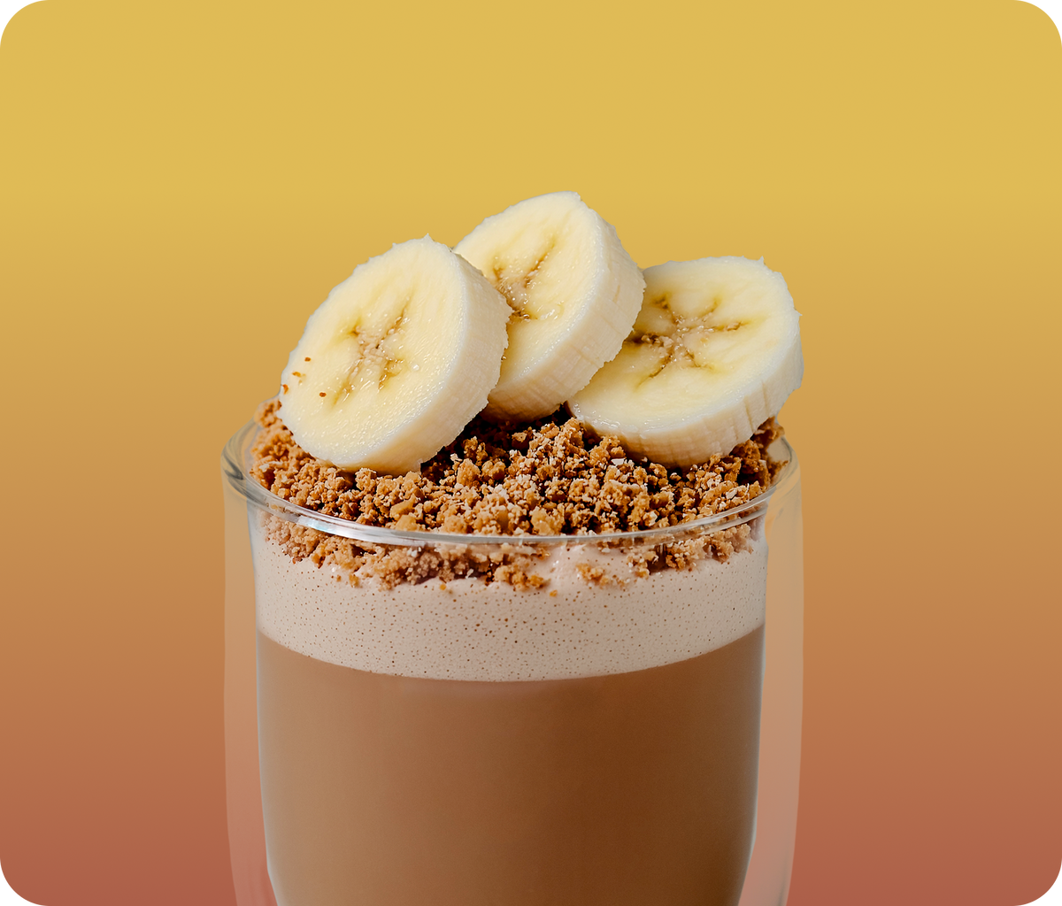 banana bread hojicha  latte with crumble and banana on top