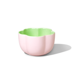 Pink Hana Matcha Bowl with a green interior and scalloped rim.