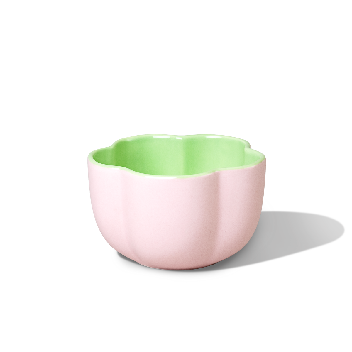 Pink Hana Matcha Bowl with a green interior and scalloped rim.
