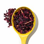 pure hibiscus tea in yellow spoon