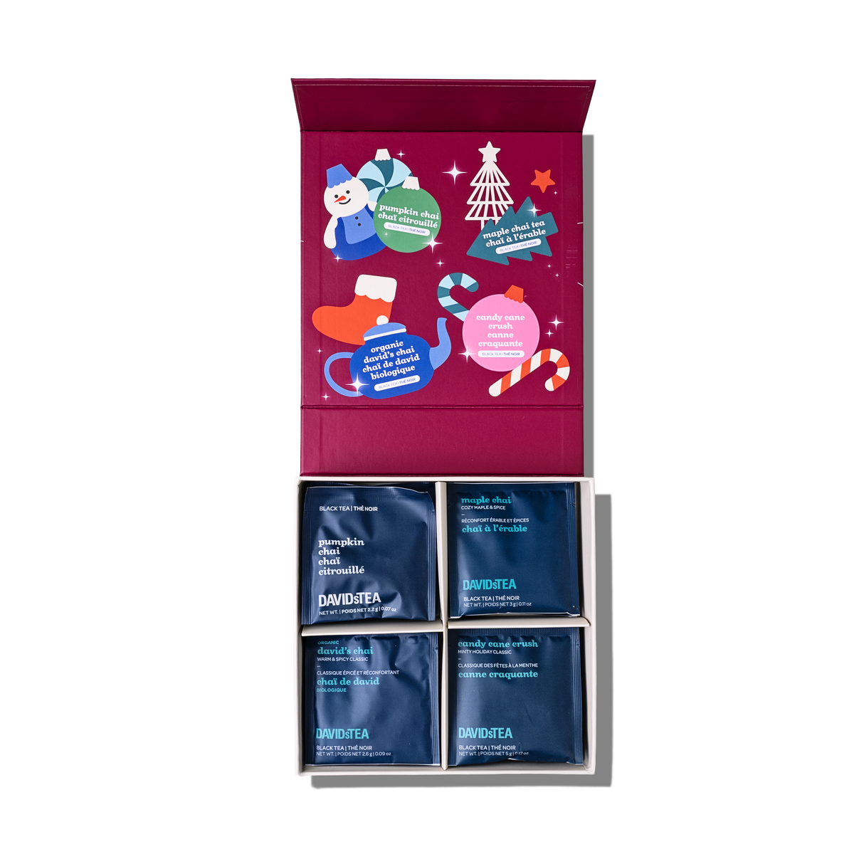 Open Holiday Favourites mini tea chest showing individually wrapped tea sachets.