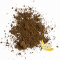 dark brown banana flavored hojicha powder on white background