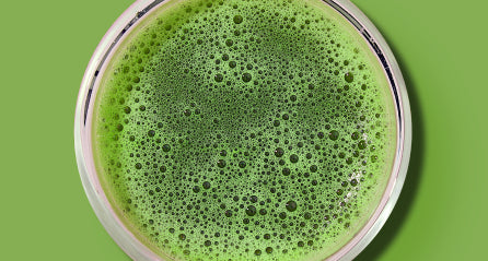 Whisked green matcha in a bowl